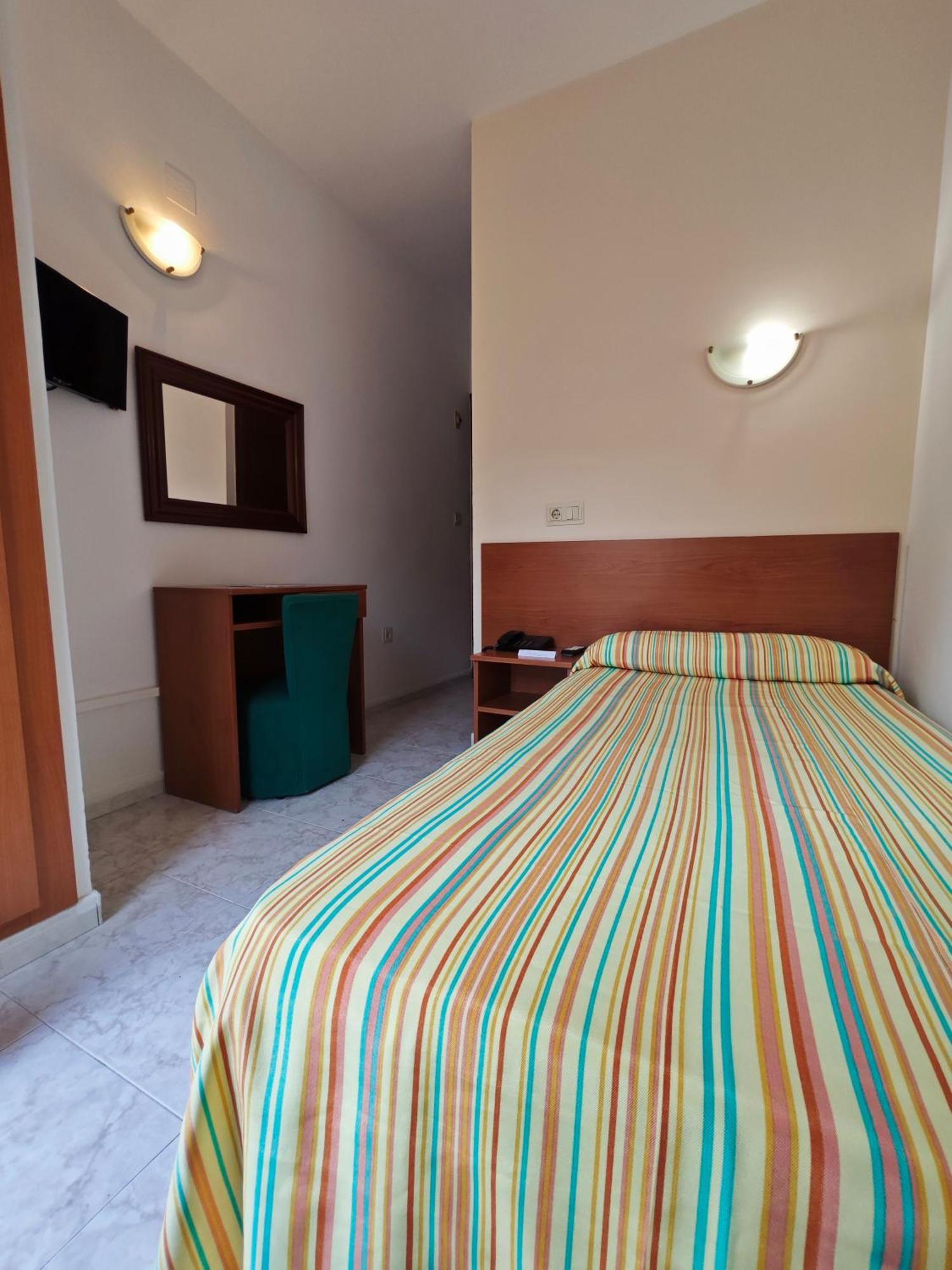 Quarto Individual com Terraço